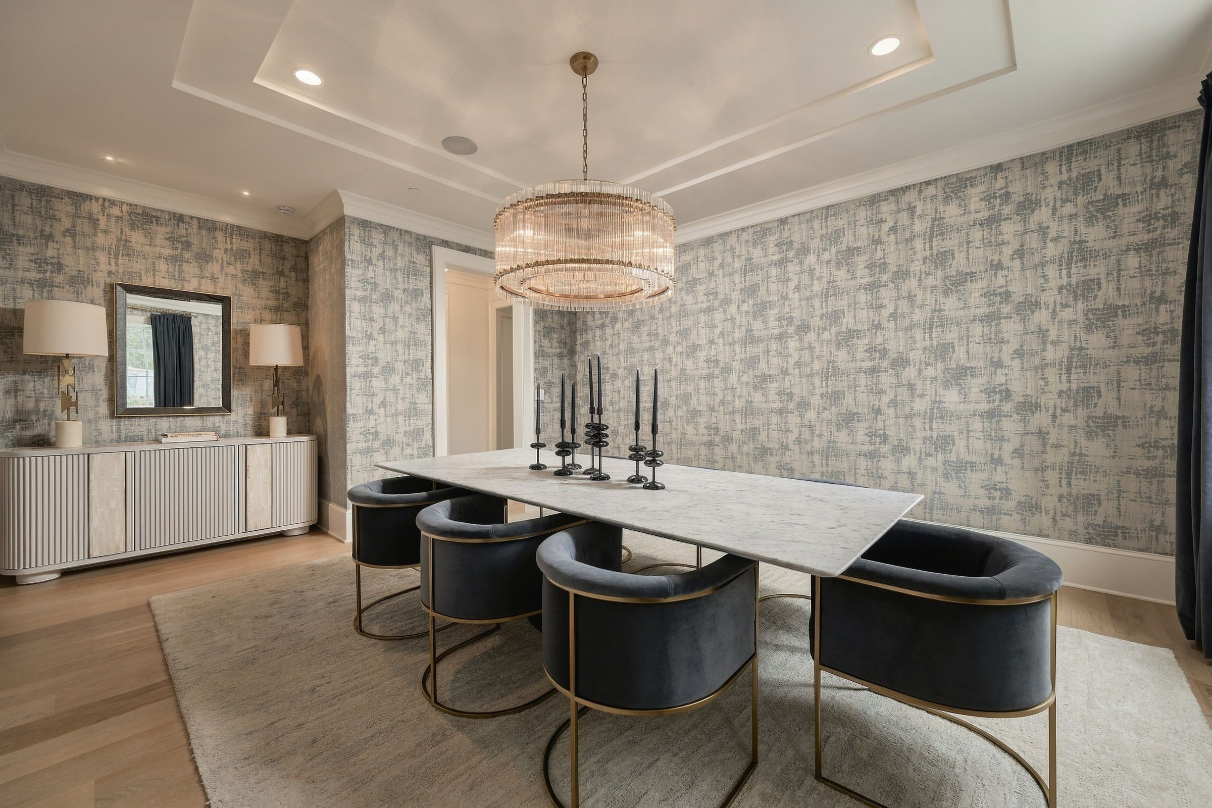 Dining room beneath a tray ceiling